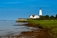 Low Tide at Muddy River Shore by Lynde Point Lighthouse